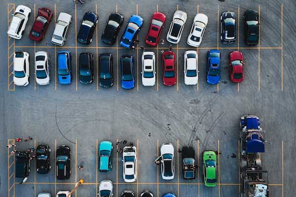 overhead view of parking lot with cars