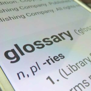 phone with the definition of glossary on it
