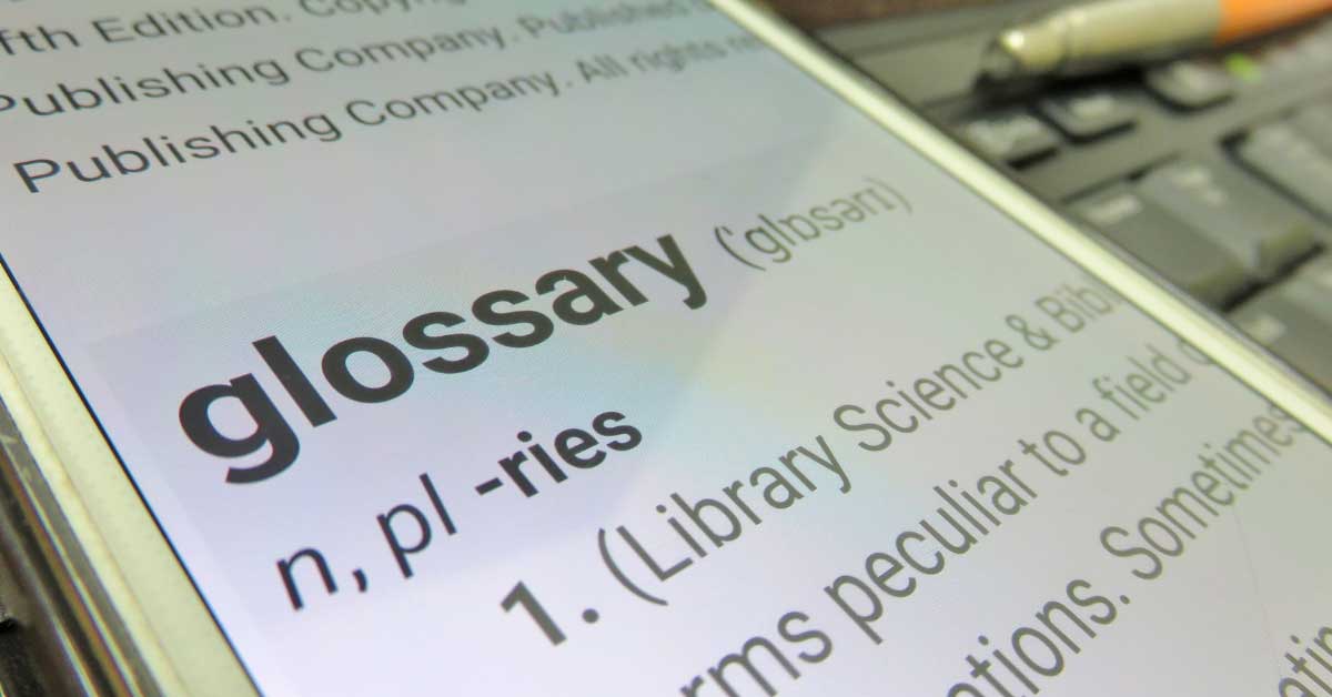 phone with the definition of glossary on it